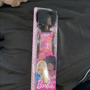 Black Barbie Doll in Colorful Dress